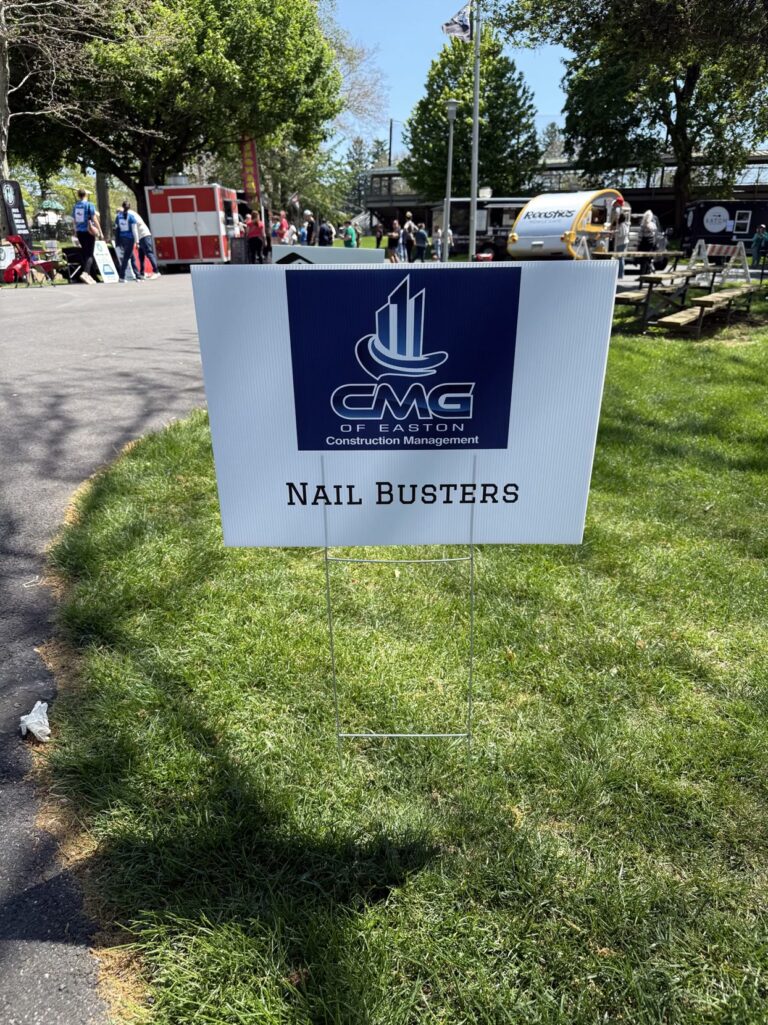 CMG of Easton Nail Busters team sign at the She Nails It charity event