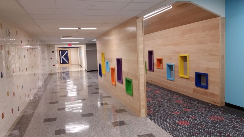School hallway with colorful wall cubbies