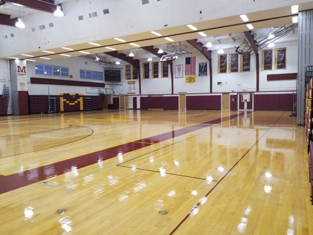 School gymnasium with a polished hardwood floor